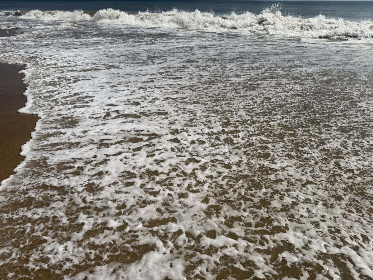 Foam and surf along the Delaware shoreline